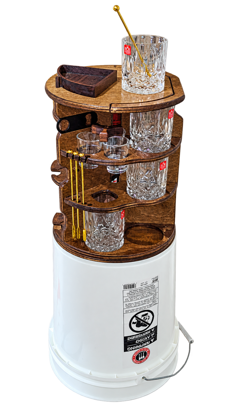 Angled view of Adam’s wooden rotating Booze Bucket minibar prototype with glassware and stirrers